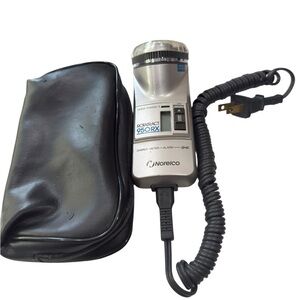 Vintage Norelco Rototract 950 RX Shaver
Charge Meter Alarm 1987 Retro Grooming